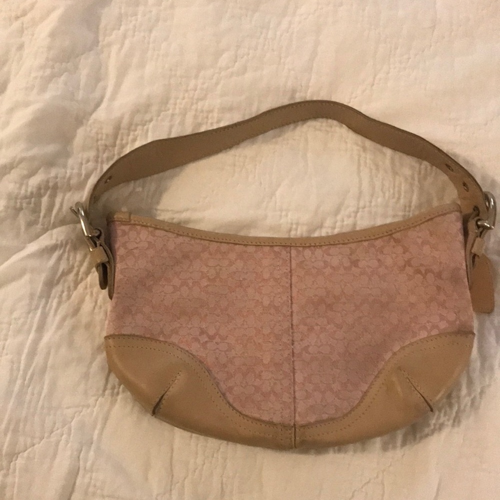 Coach pink and tan shoulder bag.